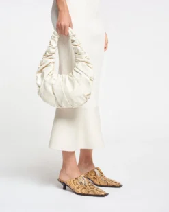 Nanushka Anja Bag - Ruched Patent Alt-Leather Shoulder Bag - Creme -Nanushka Sale Store NAN SS24 WW FULL BODY CROPPED 69