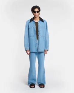 Nanushka Beaux - Leather-Trimmed Denim Shirt - Mid Blue 11 Nanushka Beaux - Leather-Trimmed Denim Shirt - Mid Blue -Nanushka Sale Store NU24PFJK00553 BEAUX MID BLUE BLACK DENIM REGEN LEATHER 1